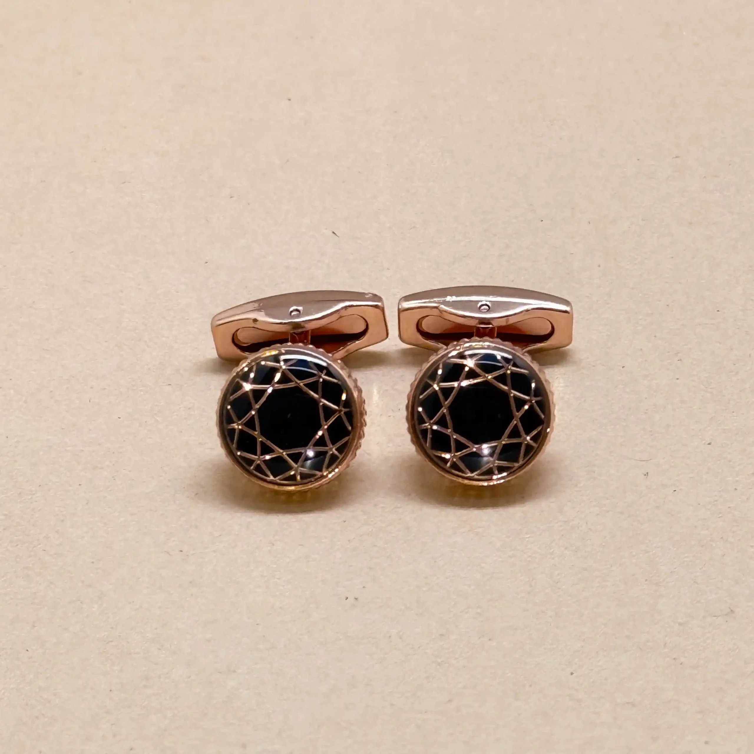 uc Rose Gold Starburst Black Crystal Cufflinks - Image 1